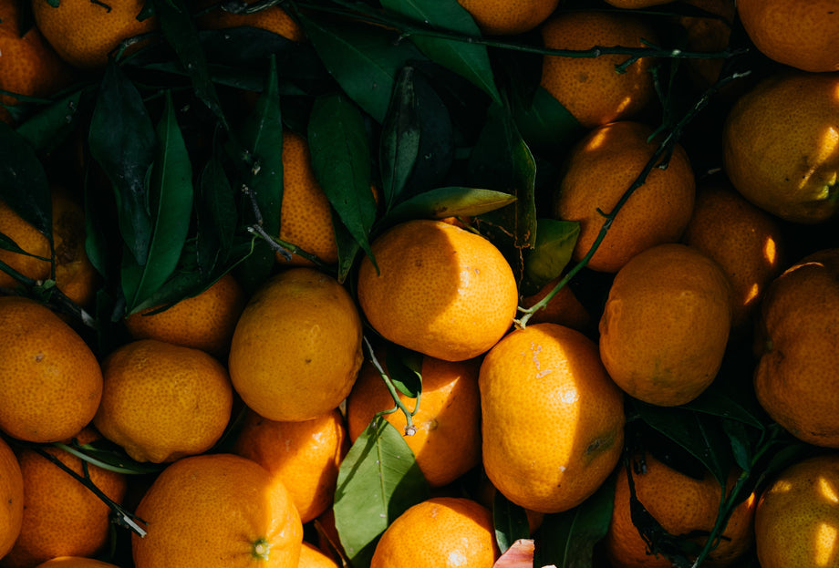 A pile of oranges, which are high in Vitamin C