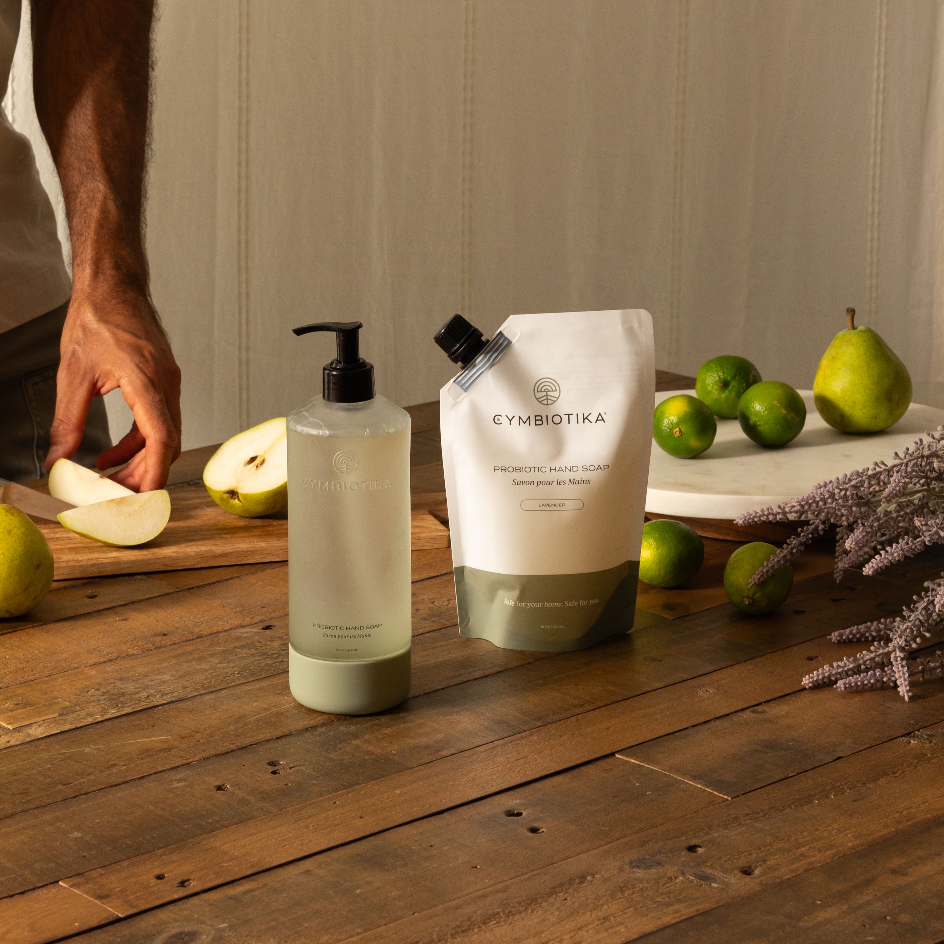 Probiotic Hand Soap Kit On Counter Next to Pear being Cut
